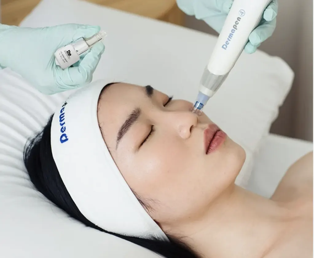 A reclining patient receiving facial skin treatment illustrating an archived health article at 23MD
