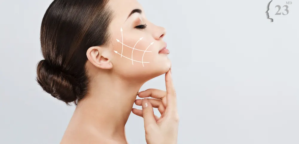 A woman touching her jawline illustrating an archived health article at 23MD