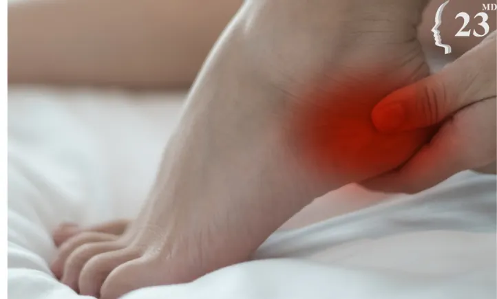 A foot with a red area near the heel illustrating an archived health article at 23MD