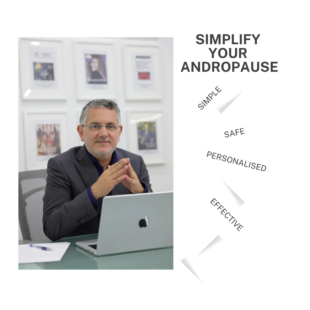 A man seated at a desk beside text about andropause illustrating an archived health article at 23MD
